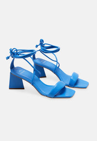 women wearing strappy heels party outfit styling USA

